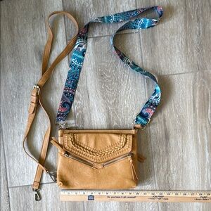 Tan Crossbody Bag with Patterned Strap and original strap.